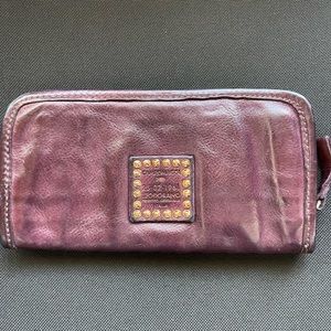 Campomaggi orchidea wallet in purple leather.